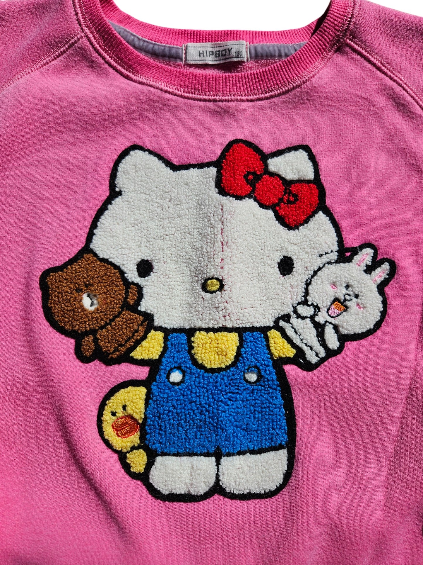 Hello Kitty crewneck Tagged 130, equivalent to 6-8y