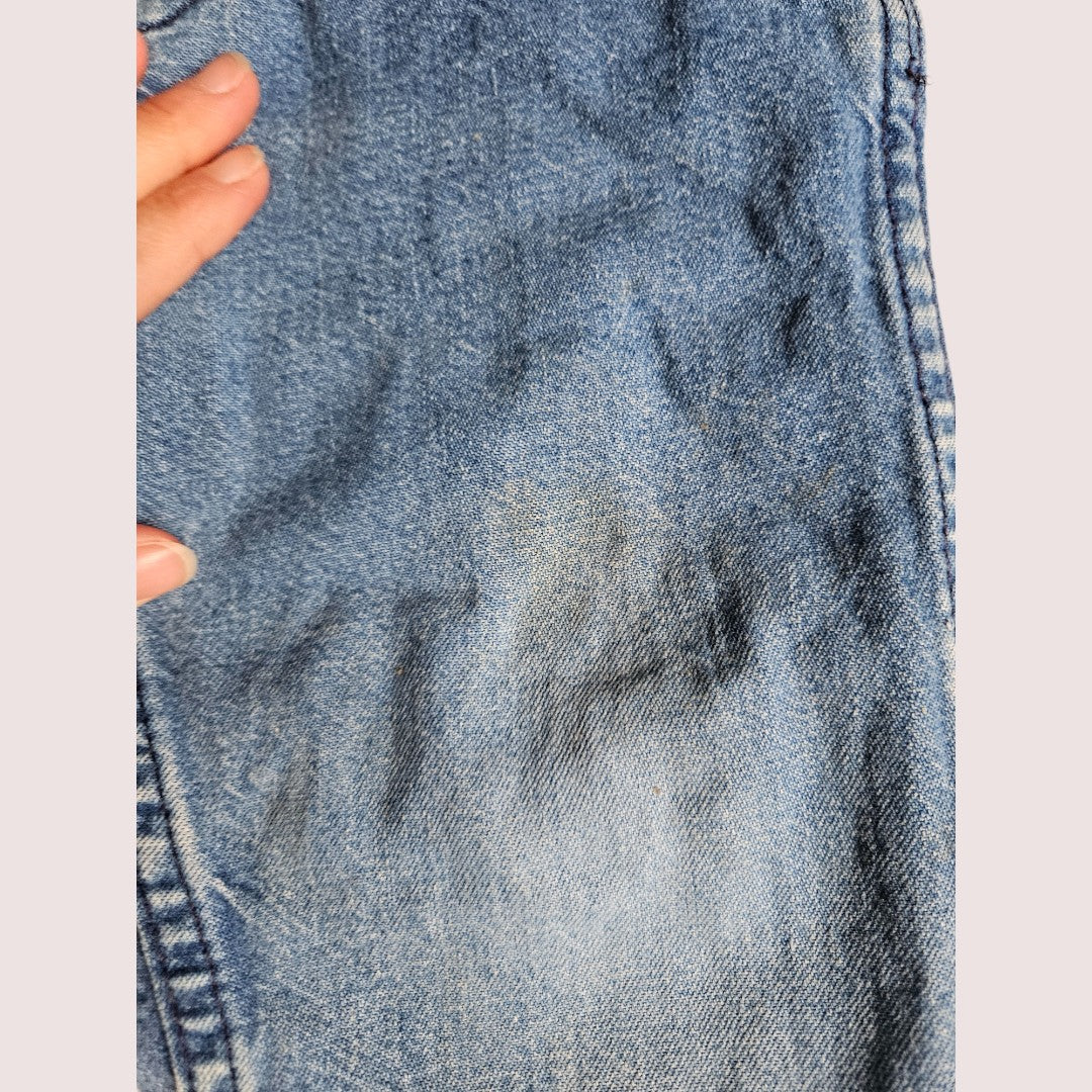 Vintage Oshkosh overalls with the contrasting red details and embossed emblem 2T