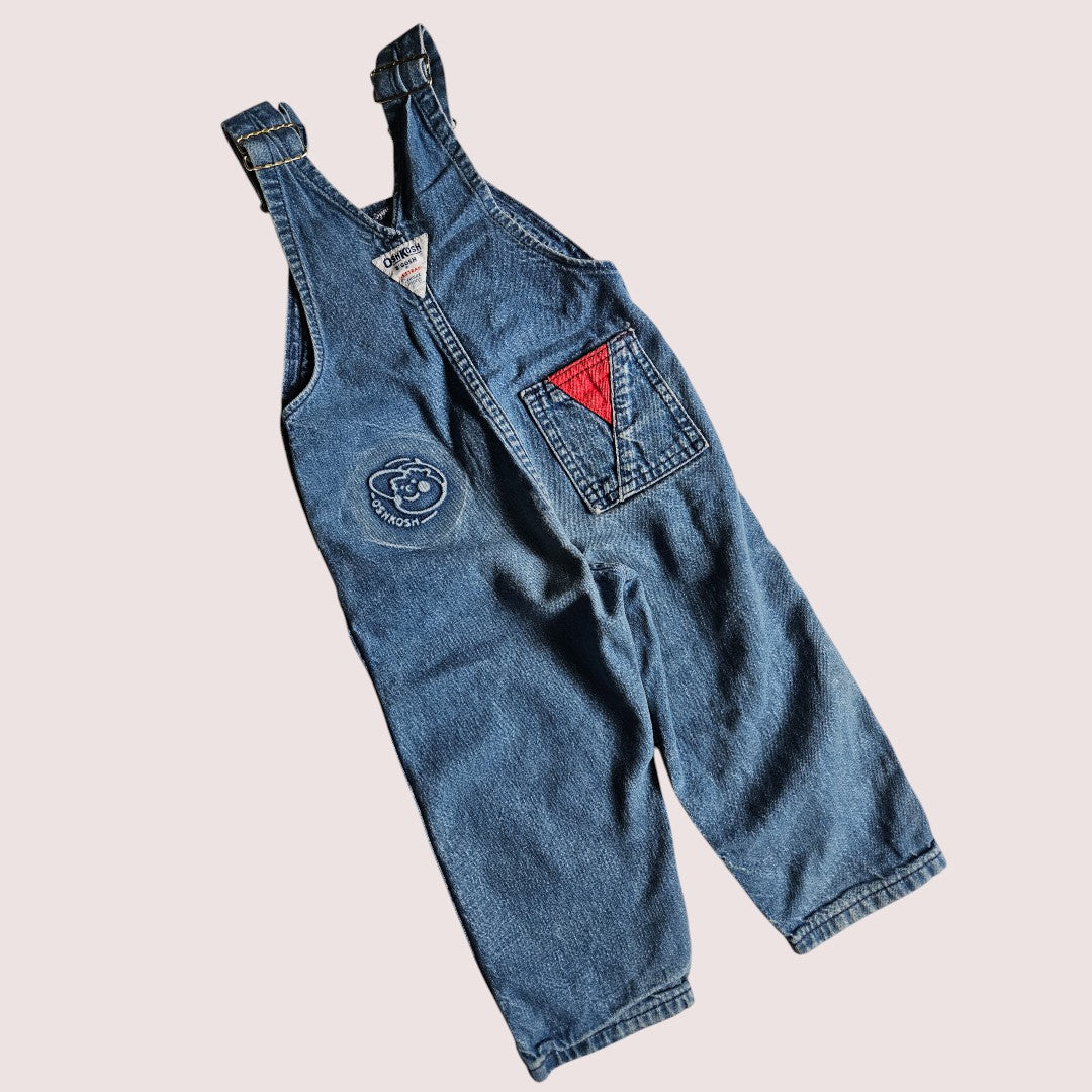 Vintage Oshkosh overalls with the contrasting red details and embossed emblem 2T