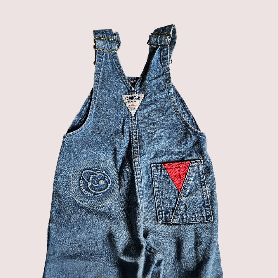 Vintage Oshkosh overalls with the contrasting red details and embossed emblem 2T