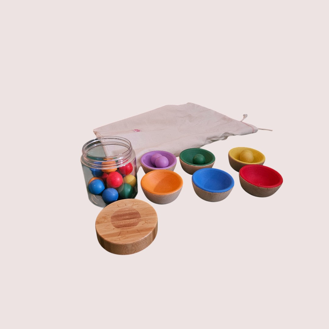 Montessori wooden coloured cups and wooden marbles