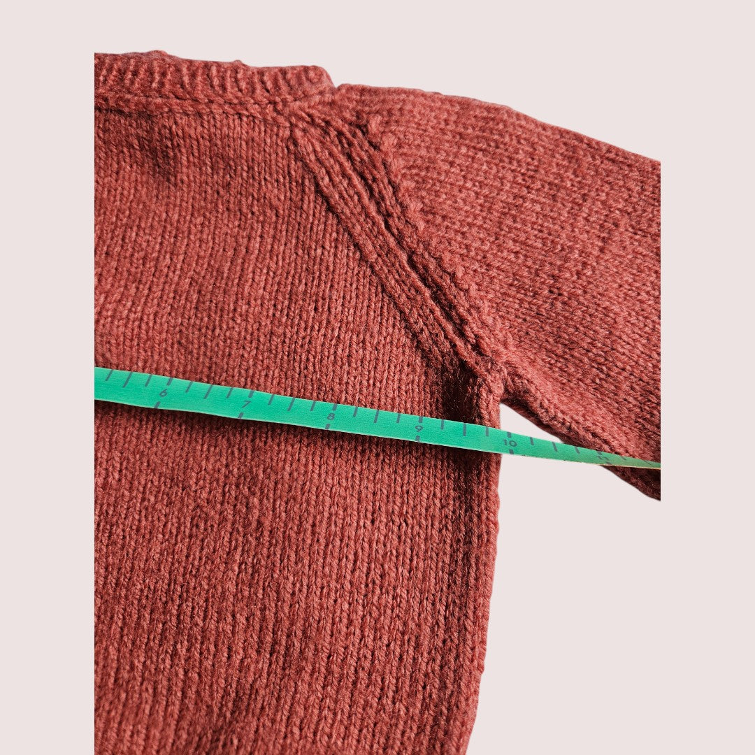 Handknit sweater in burnt orange colour 6-12m
