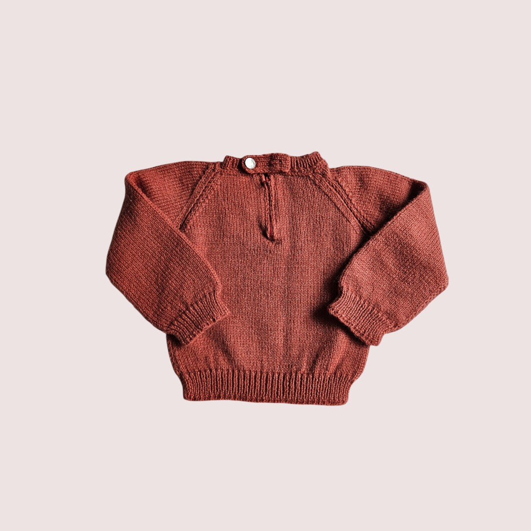 Handknit sweater in burnt orange colour 6-12m