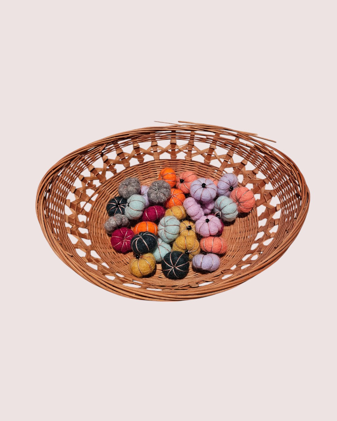 Collection of small felt pumpkins for loose play
