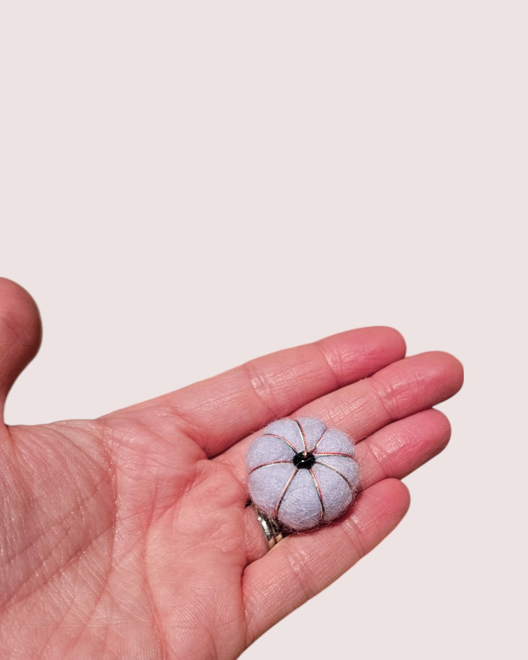 Collection of small felt pumpkins for loose play