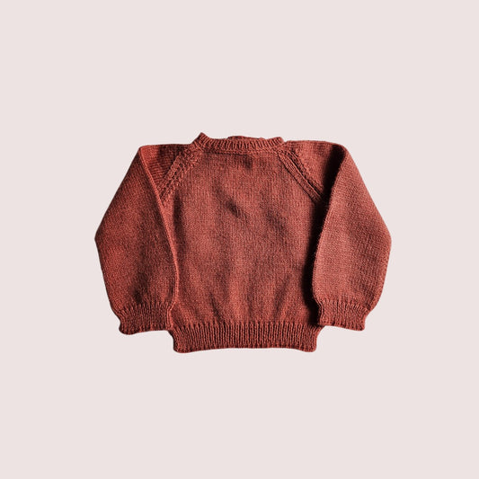 Handknit sweater in burnt orange colour 6-12m