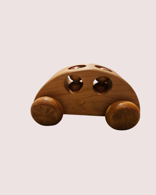 Wooden car with two peg people