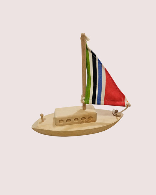 Wooden sailboat toy